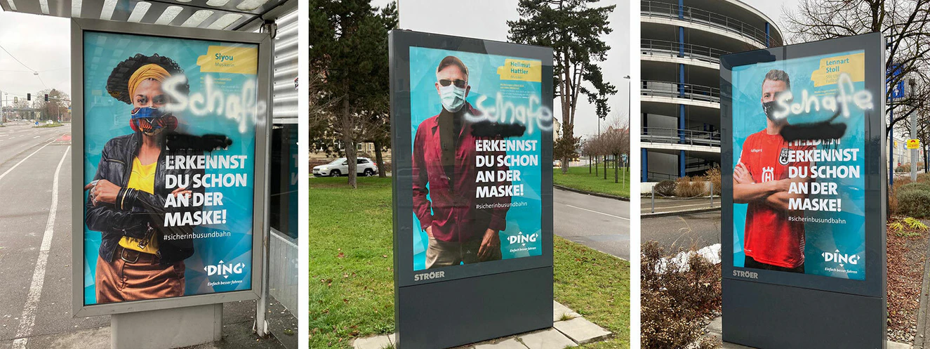 Schmierereien auf DING Plakaten 