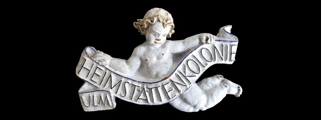 historischer Engel der ulmer heimstätte, noch heute an einigen Bestandsgebäuden vorzufinden. — © Ulmer Heimstätte